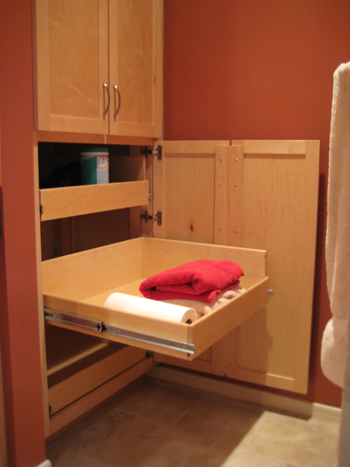 The lower half of the floor to ceiling cabinetry has 3 pull out shelves, designed for easy access to individuals in wheelchairs, or limited reaching mobility